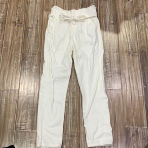 White summer jeans with a belt